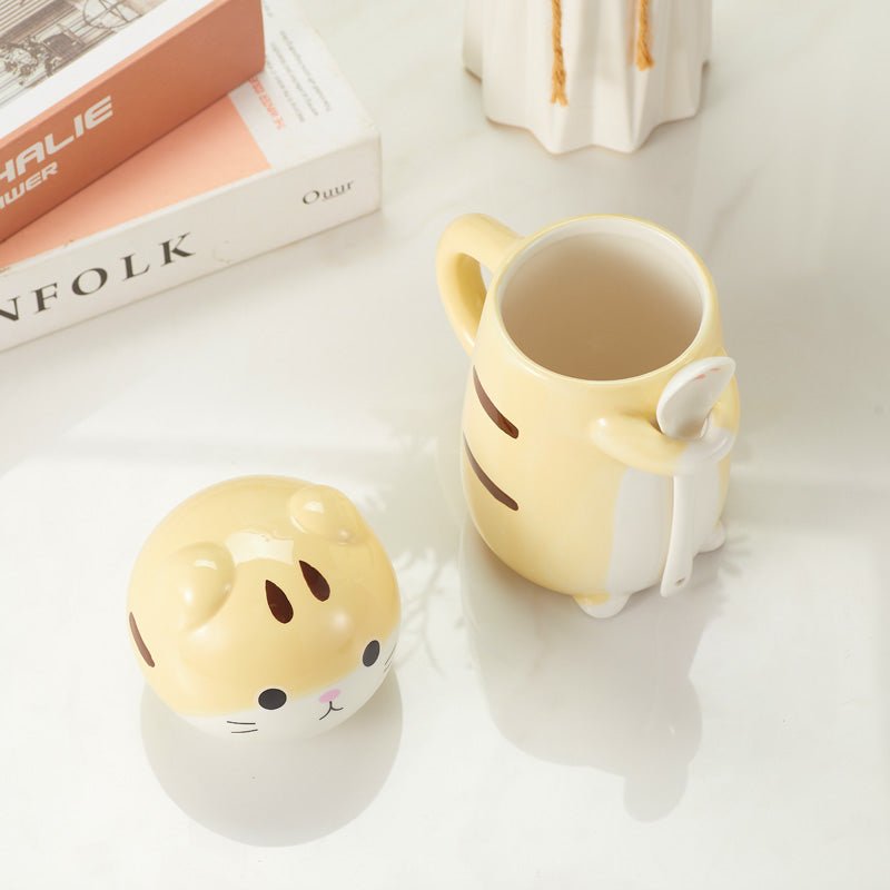 Cat mug with lid removed showing inside