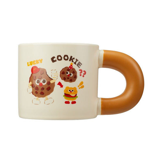 Cute cartoon cookie mug with a unique handle featuring cookie characters
