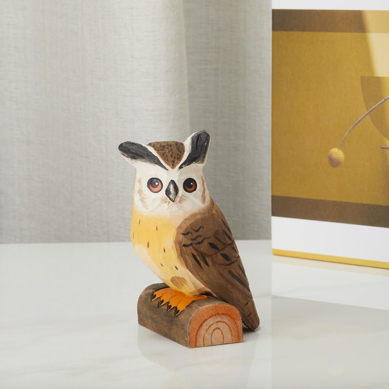 Hand-carved wooden owl figurine, front view