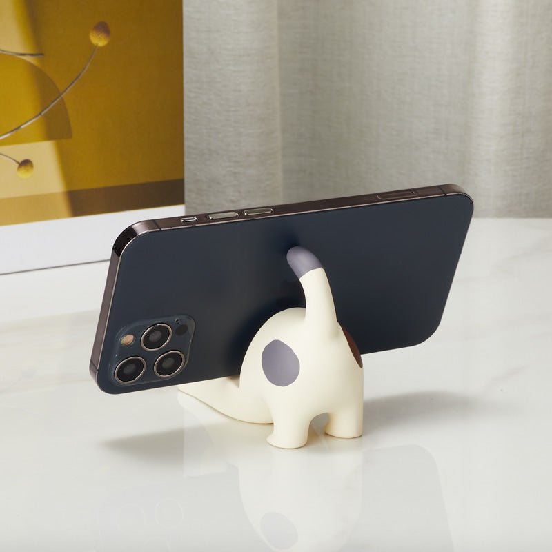 Cat phone holder supporting a smartphone from the back