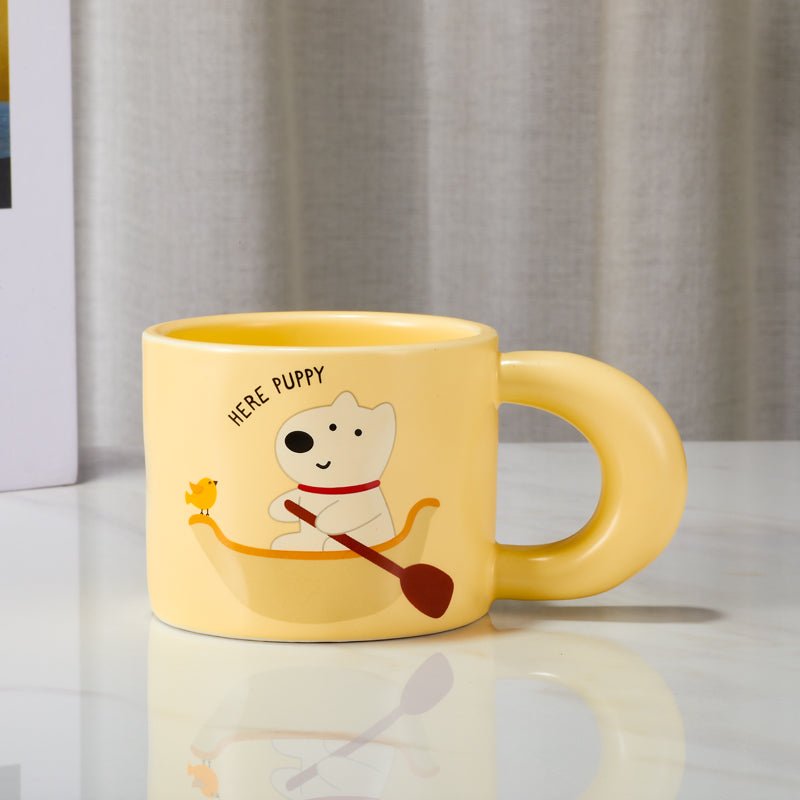 Front view of the cute puppy and bird cartoon mug with unique handle