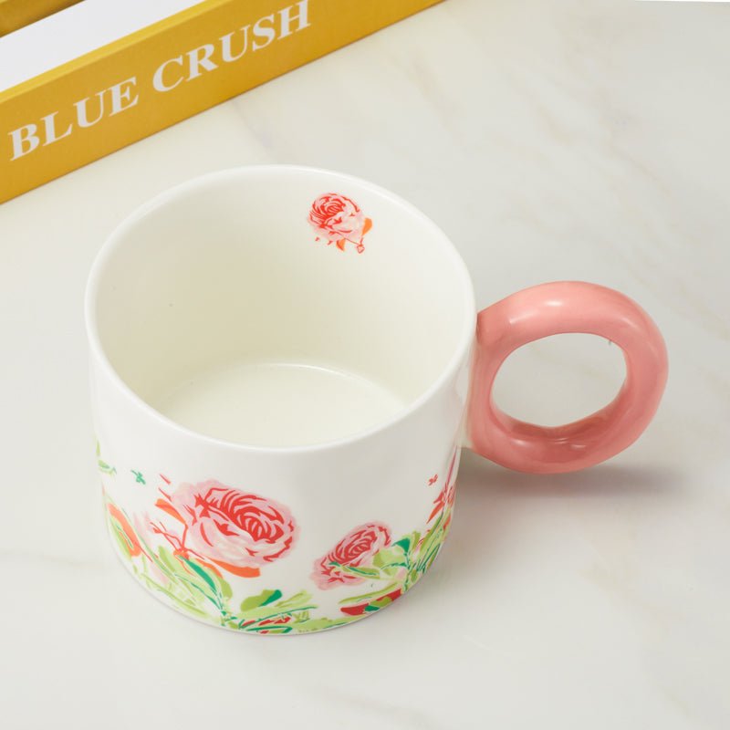 Top View of Floral Ceramic Mug with Pink Handle