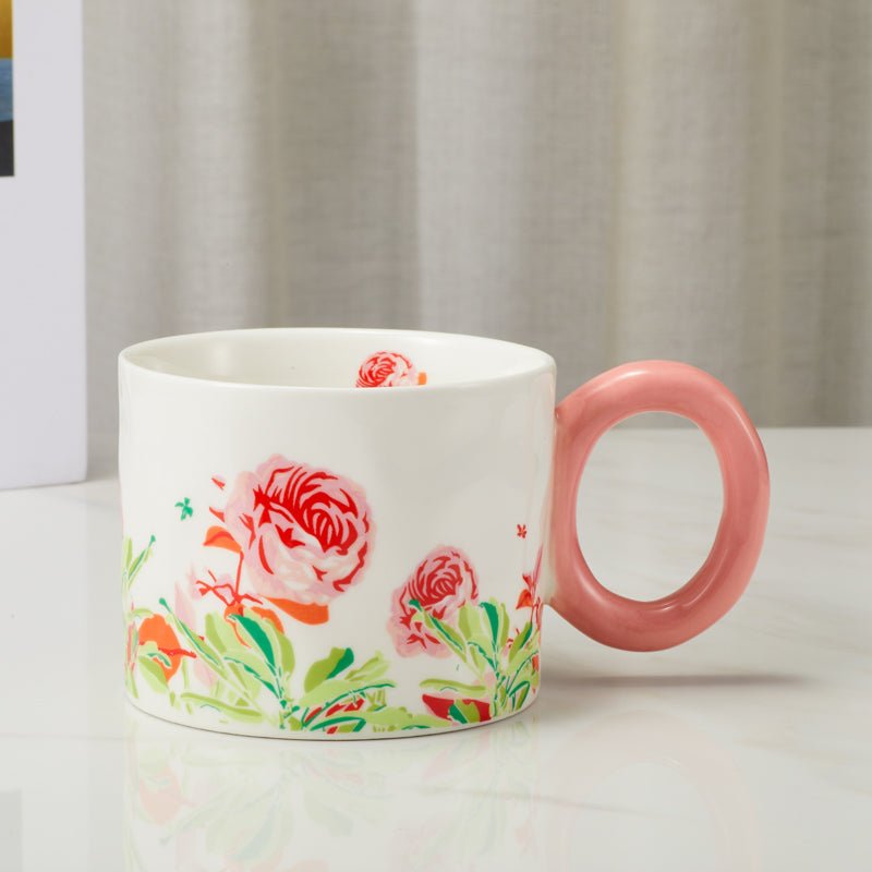 Side View of Floral Ceramic Mug with Pink Handle