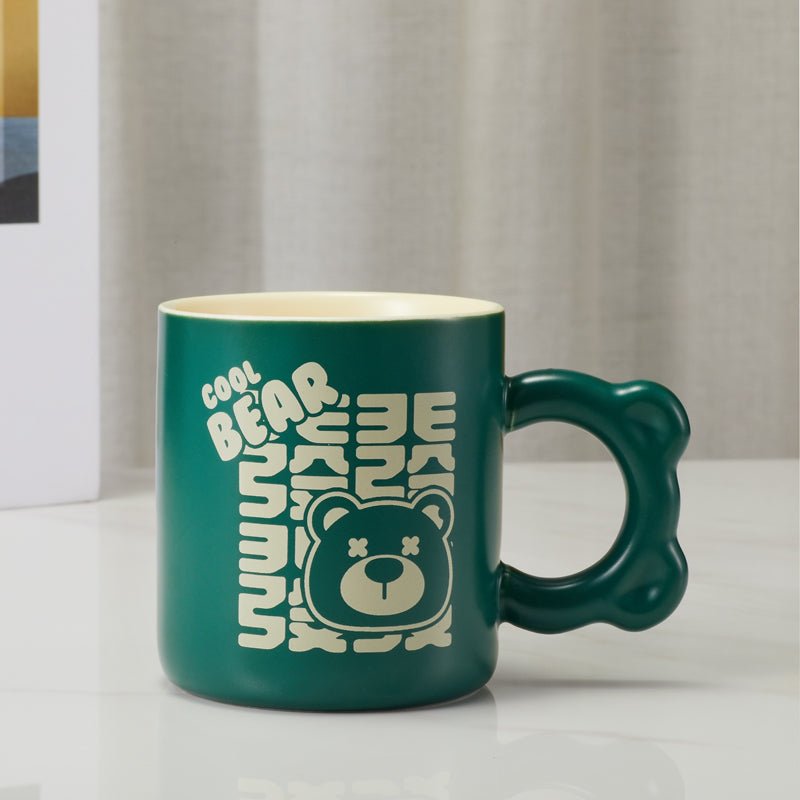 Front view of green cool bear mug with unique bear-shaped handle