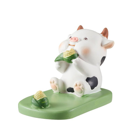 cow phone holder with corn snack