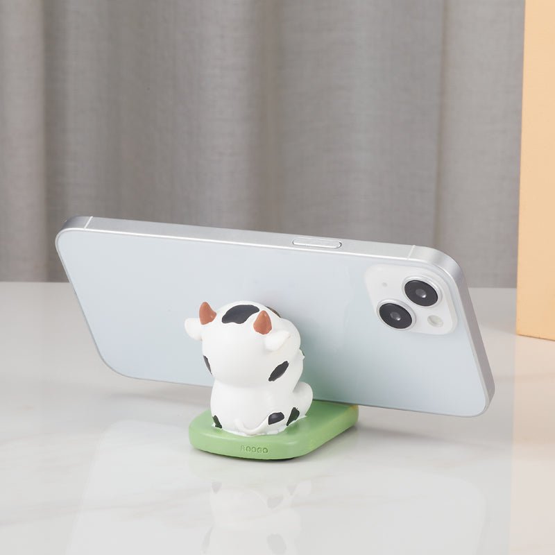 Back view of cow phone holder with phone