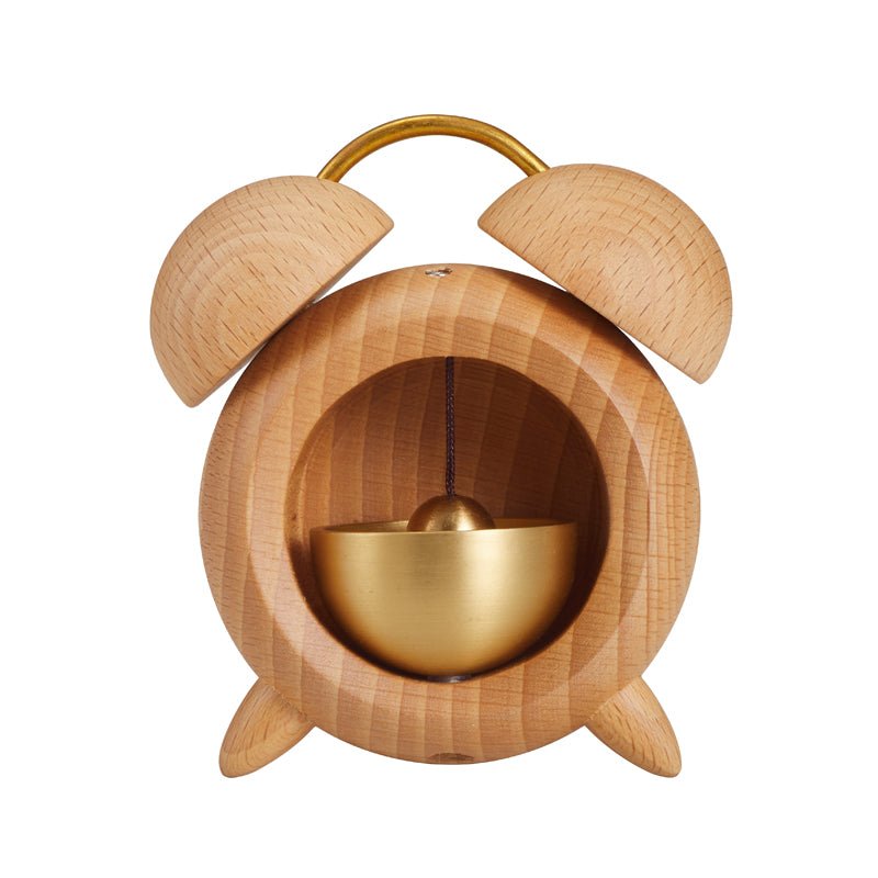 Handcrafted wooden alarm clock bell, front view.