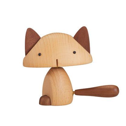 Handcrafted wooden cat figurine, front view