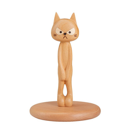 Handcrafted wooden angry cat figurine, front view