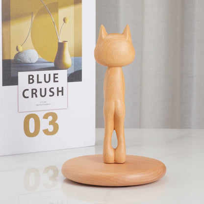 Wooden angry cat figurine