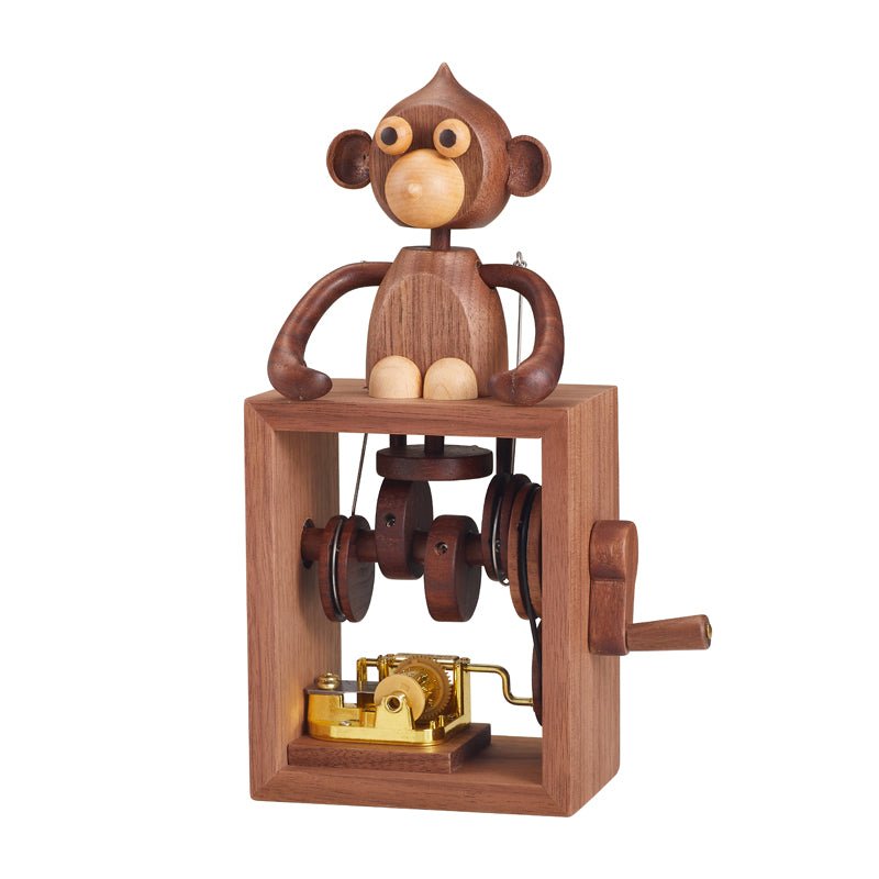 Handcrafted wooden monkey music box, front view