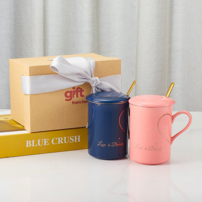 Blue and pink Love is Beauty ceramic mugs with a gift box