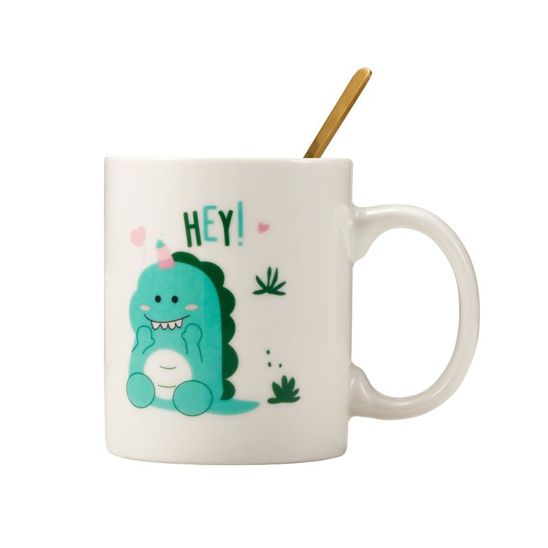 Image of white ceramic mug with a cute green dinosaur and the word "HEY!