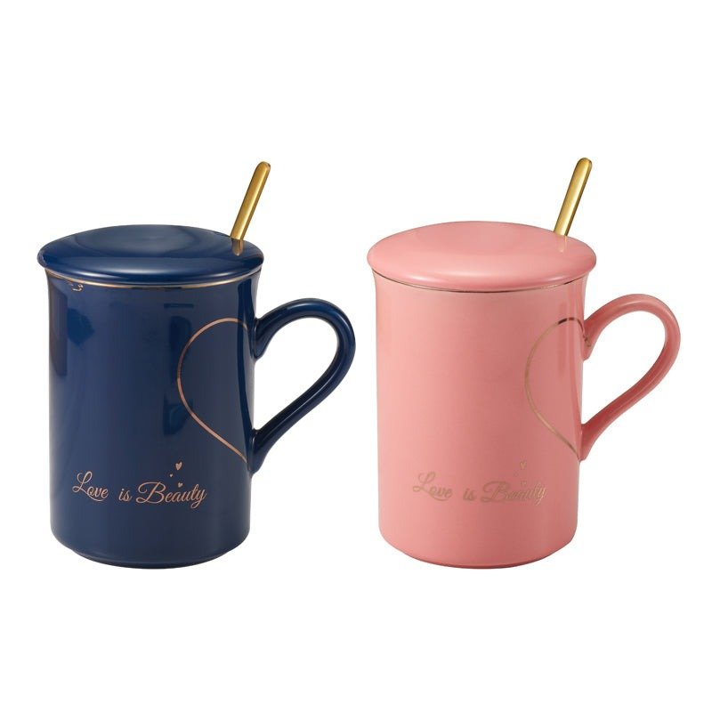 Love is Beauty ceramic mugs in blue and pink with gold spoons
